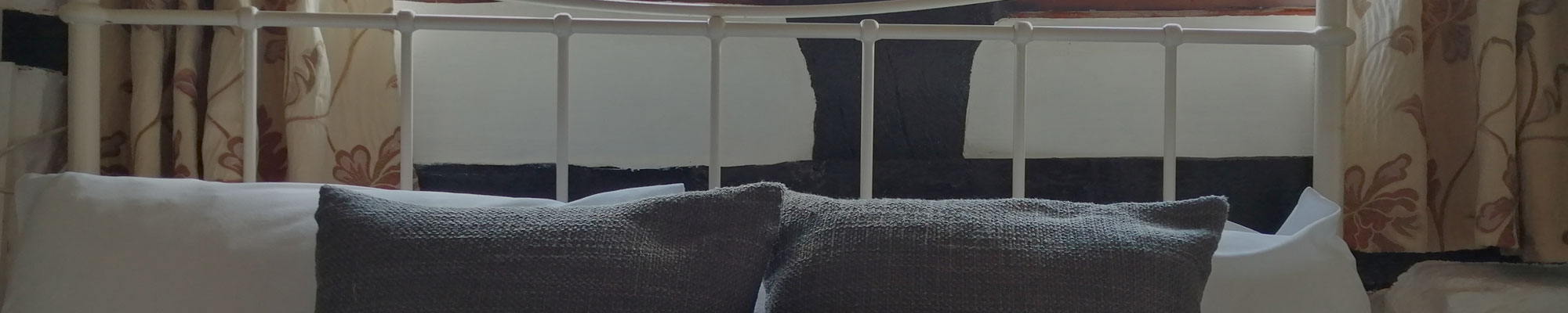 Bedroom of self-catering cottage in Bangor-on-Dee