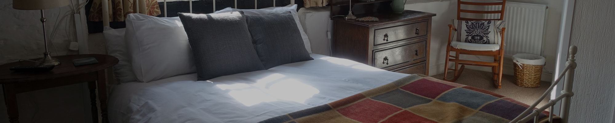 Master bedroom interior at The Stableyard in Bangor-on-Dee